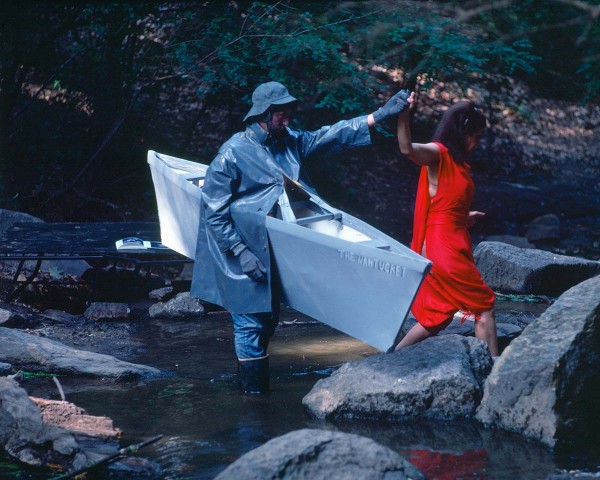 The Nantucket Memorial guides the Woman in Red to the other side of the stream, performance Rivers First Draft by Lorraine O’Grady.